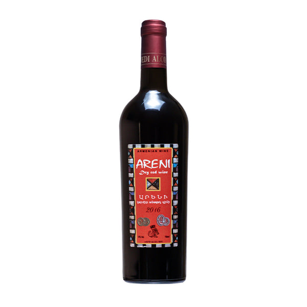 Red wine bottle with a visible label on a light gray background