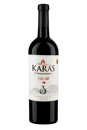 Bottle of KARAS olive oil with a black background